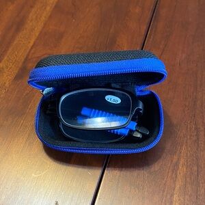 Folding Readers. 1.50. New in case